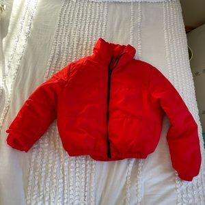 Red puffer jacket